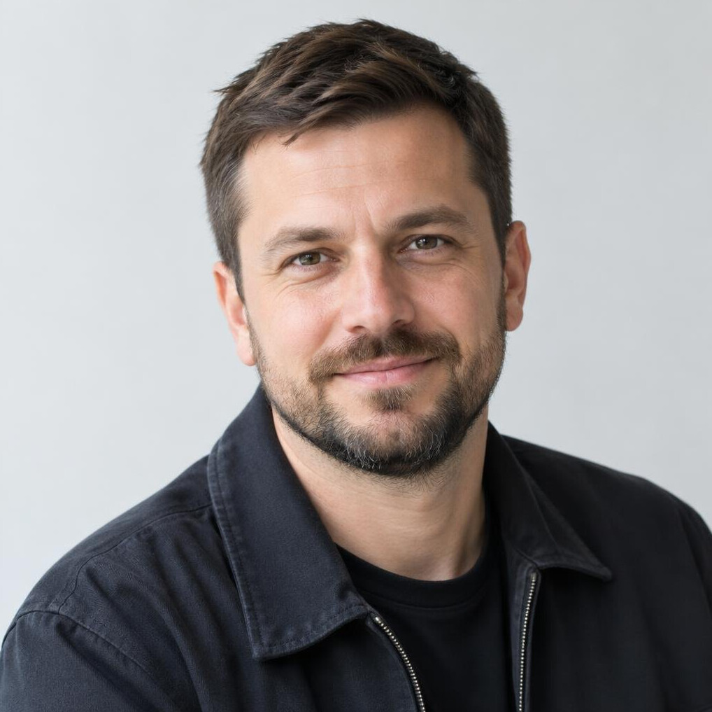 Portrait of a man editor in his thirties with short brown hair